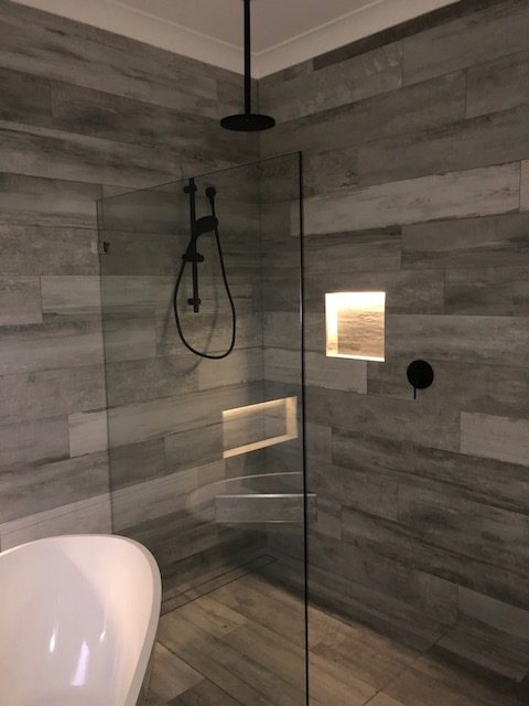 grey slate bathroom shower with undertile heating