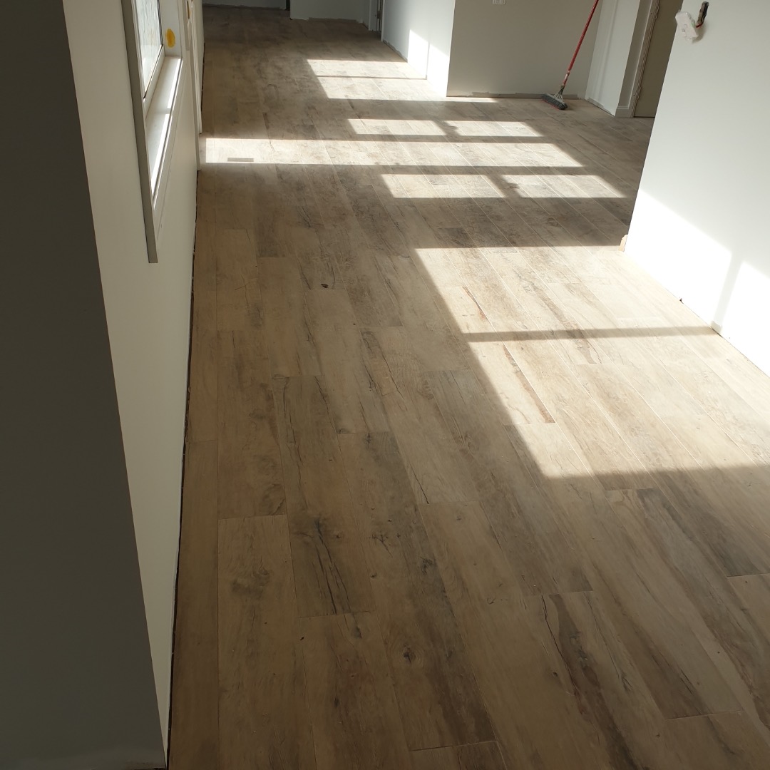 Natural wooden floor hallway with undertile heating