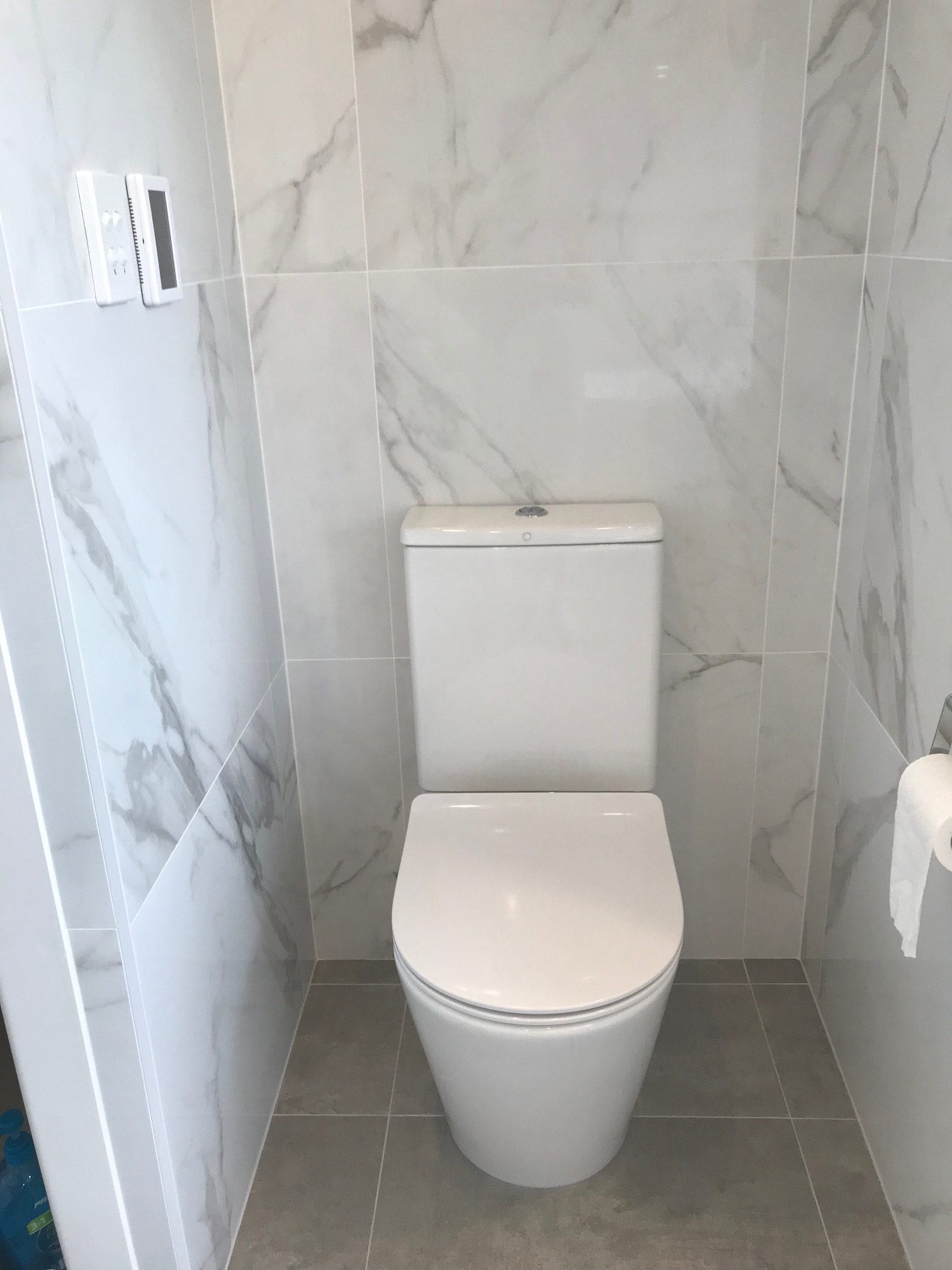 White Marble toilet area with Warmtech Inscreed heating system