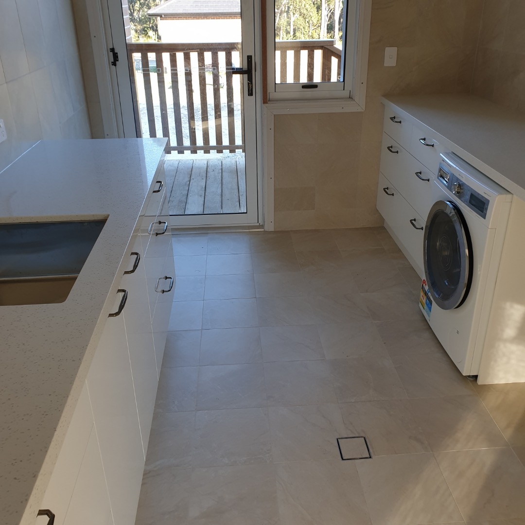 tiled laundry with underfloor heating